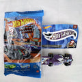 Hot Wheels Formula Flashback 1:64 scale purple diecast racer with gold wheels and matching sticker.