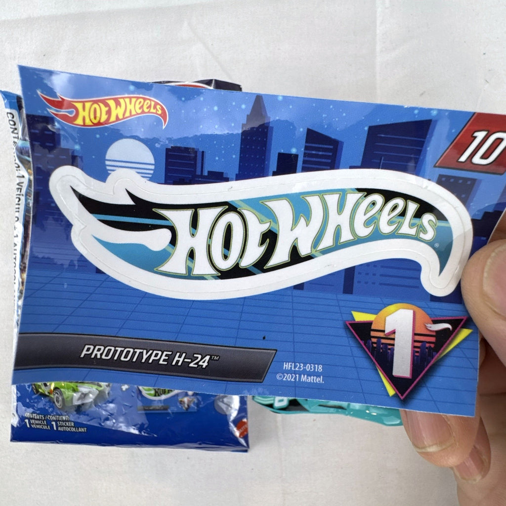 Teal Hot Wheels Prototype H-24 diecast 1:64 scale car with number 10 racing graphics and white 5-spoke wheels.