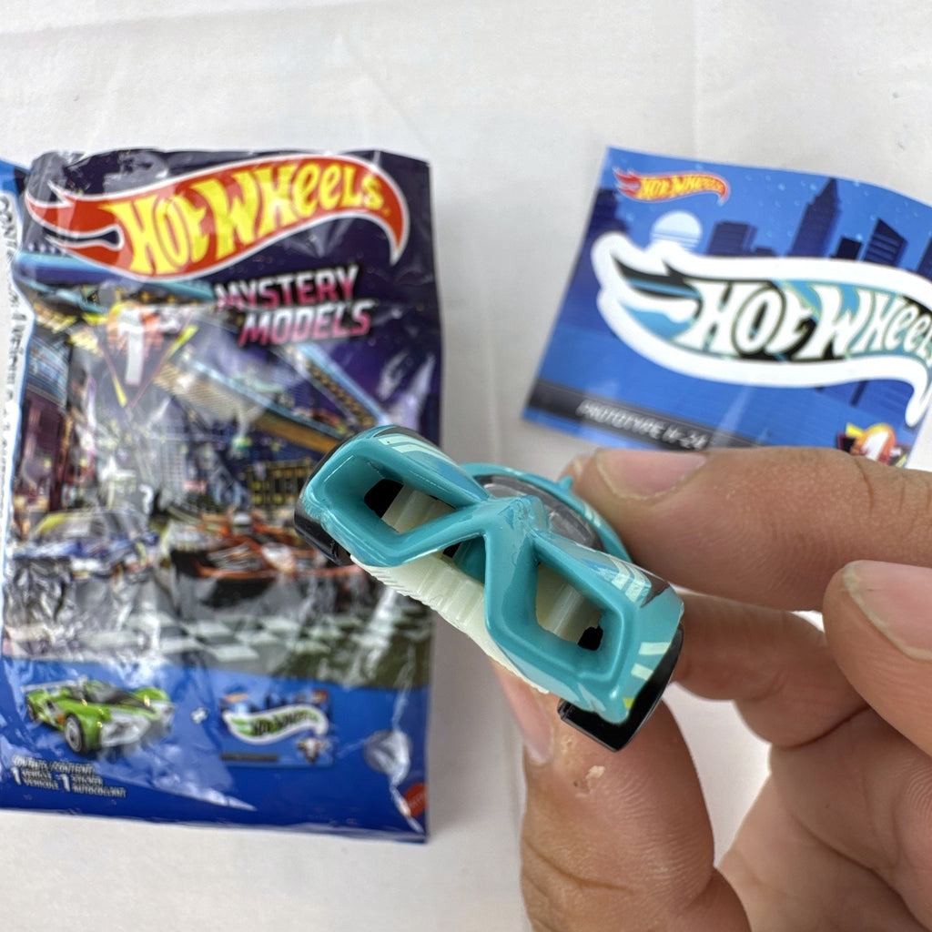 Teal Hot Wheels Prototype H-24 diecast 1:64 scale car with number 10 racing graphics and white 5-spoke wheels.