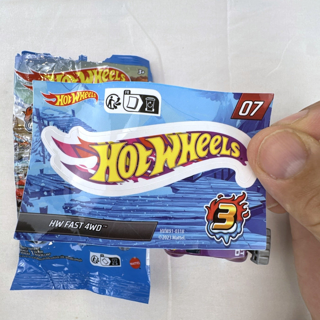 Hot Wheels 1:64 scale Fast 4WD diecast car in metallic purple from Mystery Models Series 3 with original packaging