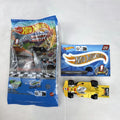 Hot Wheels 1:64 scale Formula Flashback Mystery Models Series 1 yellow diecast racer with sticker card and opened foil pouch