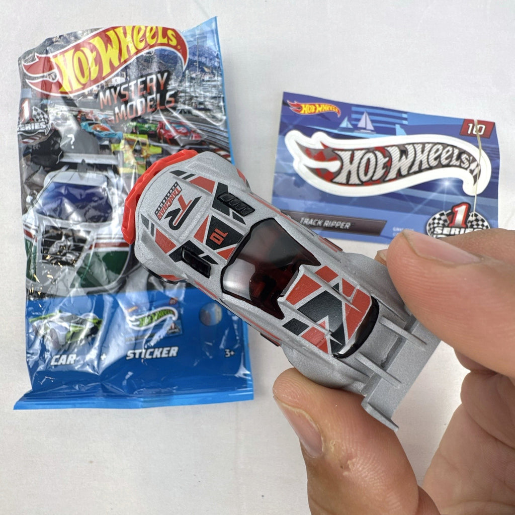Hot Wheels Track Ripper 1:64 scale diecast car in silver with red racing graphics and matching #10 sticker.