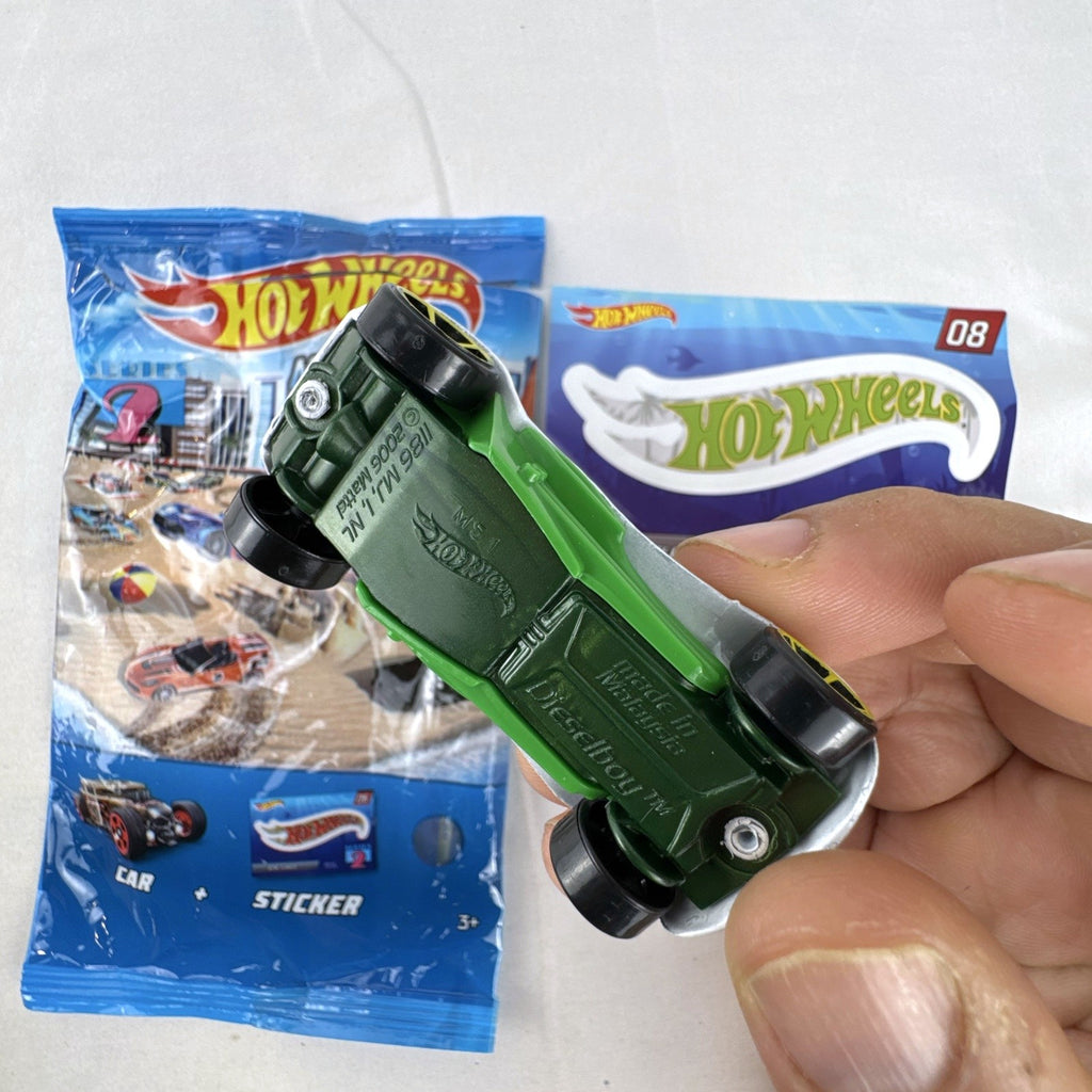 Hot Wheels 1:64 scale Dieselboy diecast car in white and green with original 2020 Mystery Models Series 2 bag and sticker card.