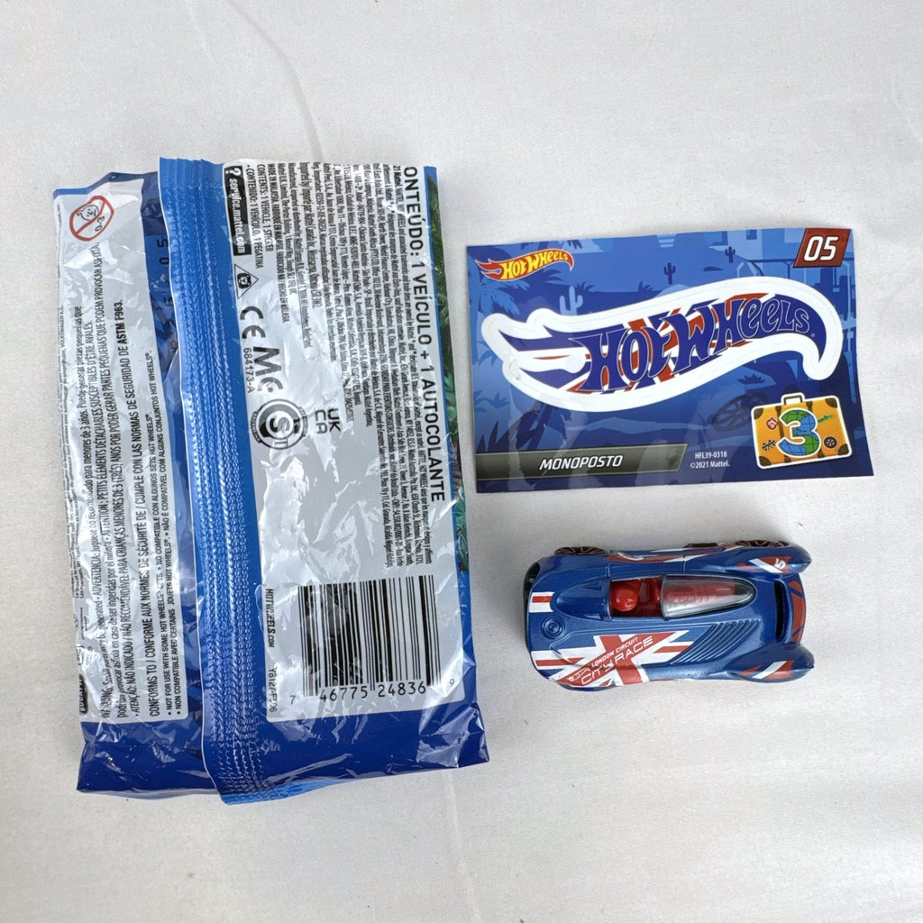 Hot Wheels Monoposto Mystery Models Series 3 #05 blue diecast car with Union Jack livery, original bag, and sticker card.