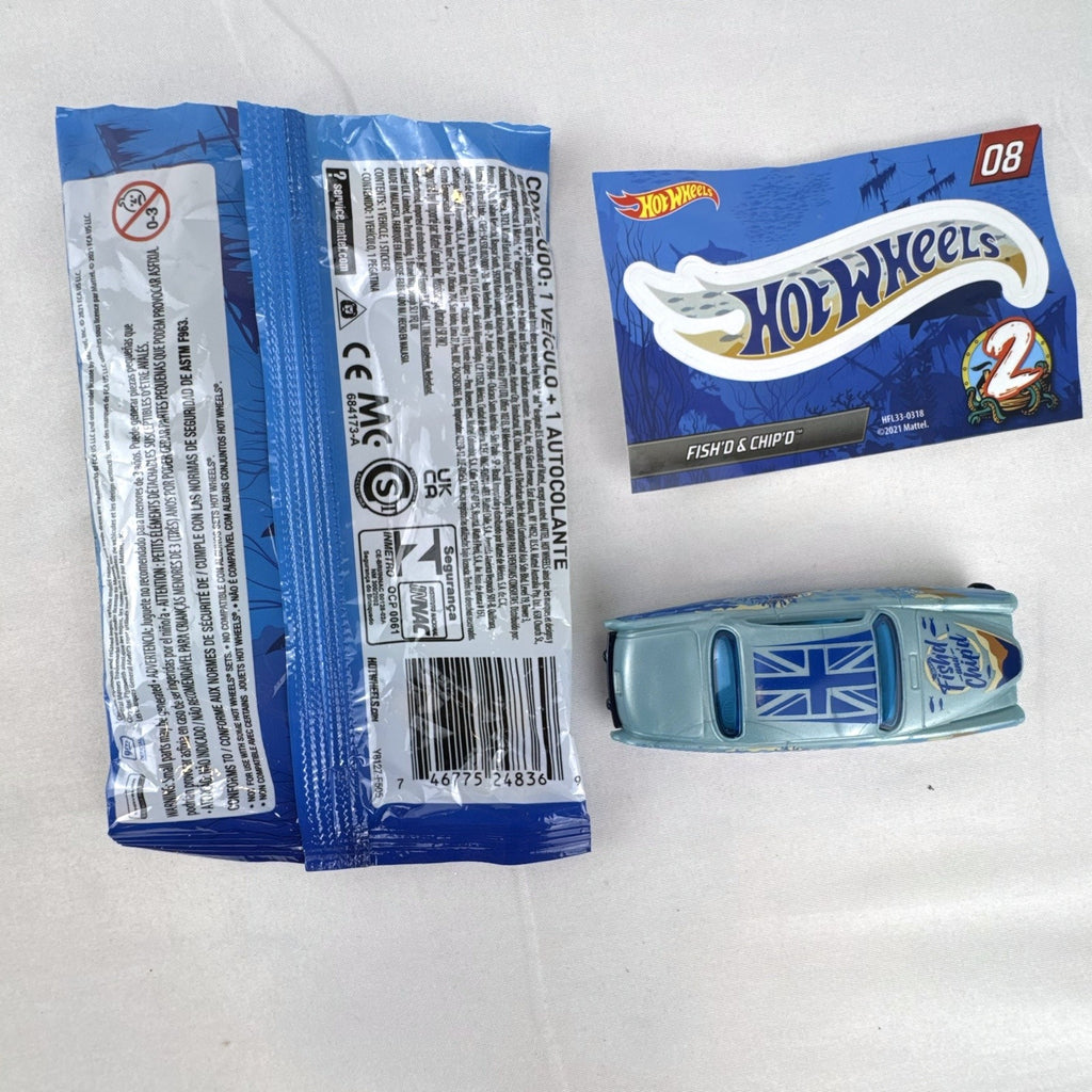 Hot Wheels Fish'd & Chip'd 1:64 scale diecast car in light blue with Union Jack roof graphic and bonus sticker.