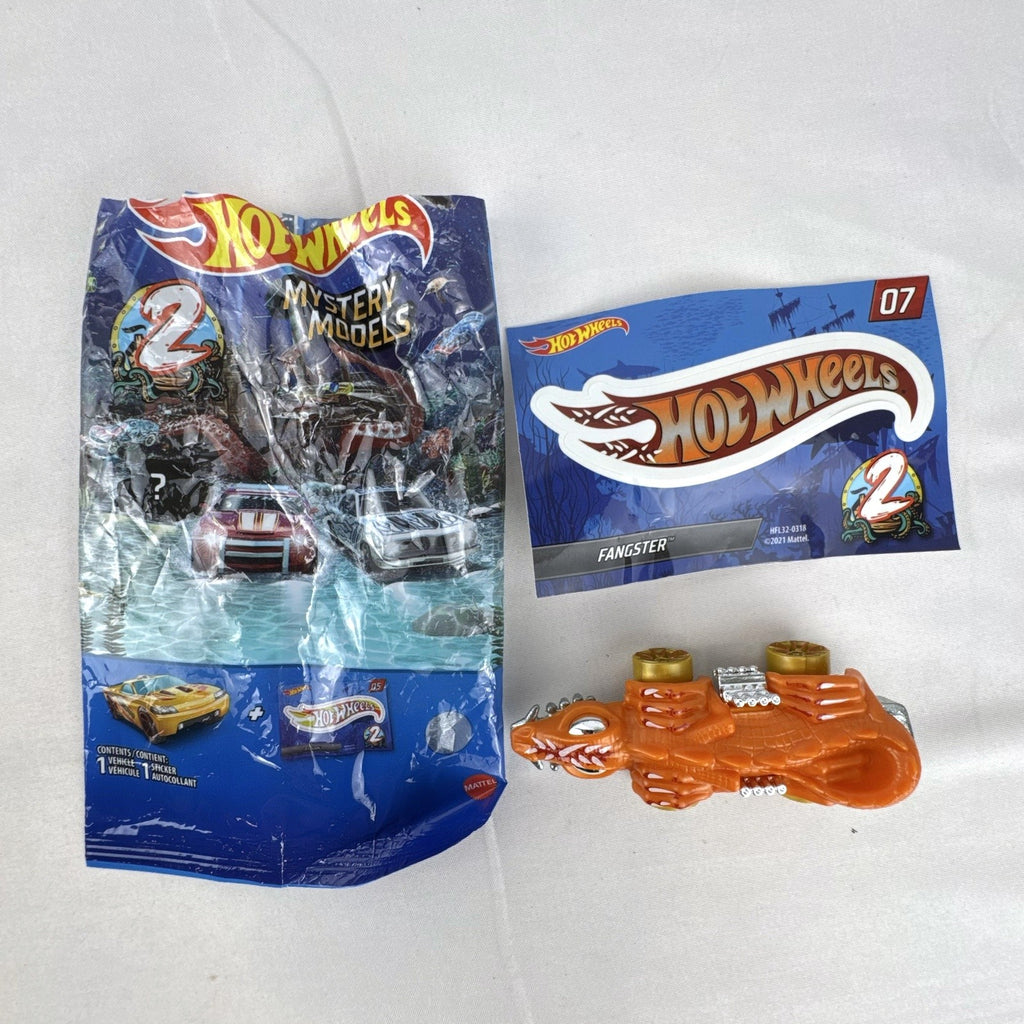 Hot Wheels Mystery Models Series 2 Fangster orange 1:64 scale diecast car with original bag and sticker