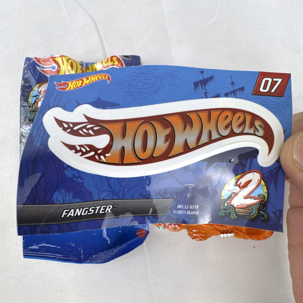 Hot Wheels Mystery Models Series 2 Fangster orange 1:64 scale diecast car with original bag and sticker