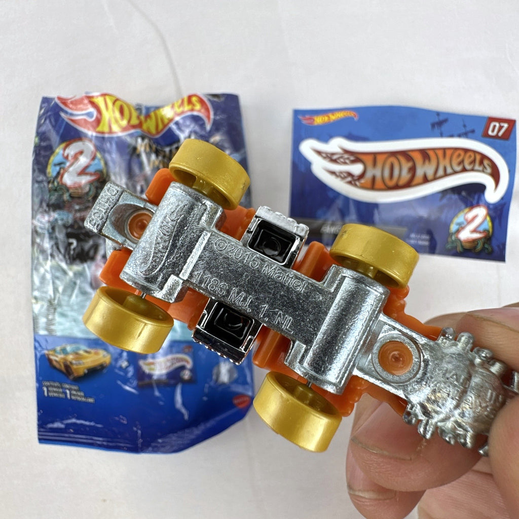 Hot Wheels Mystery Models Series 2 Fangster orange 1:64 scale diecast car with original bag and sticker