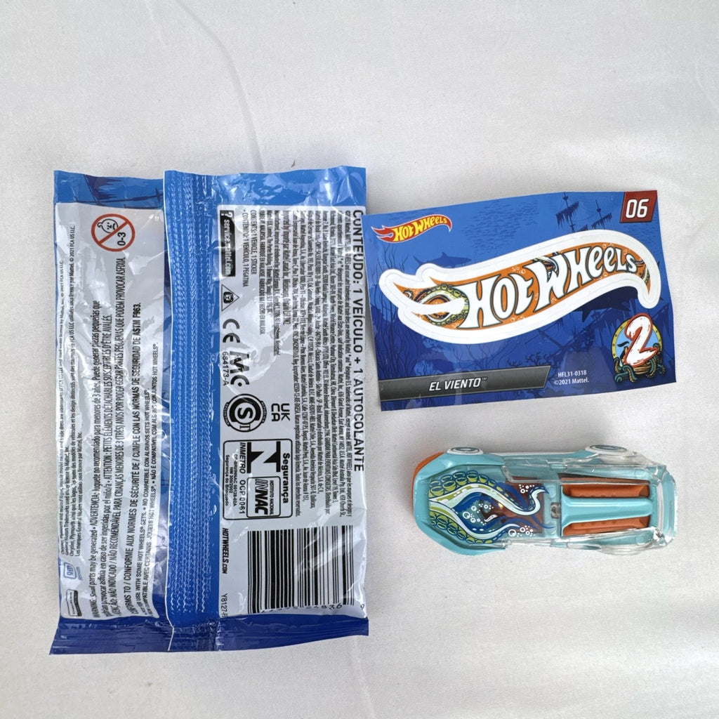 Hot Wheels El Viento Mystery Models Series 2 light blue diecast car with octopus graphics, foil pouch, and sticker card.