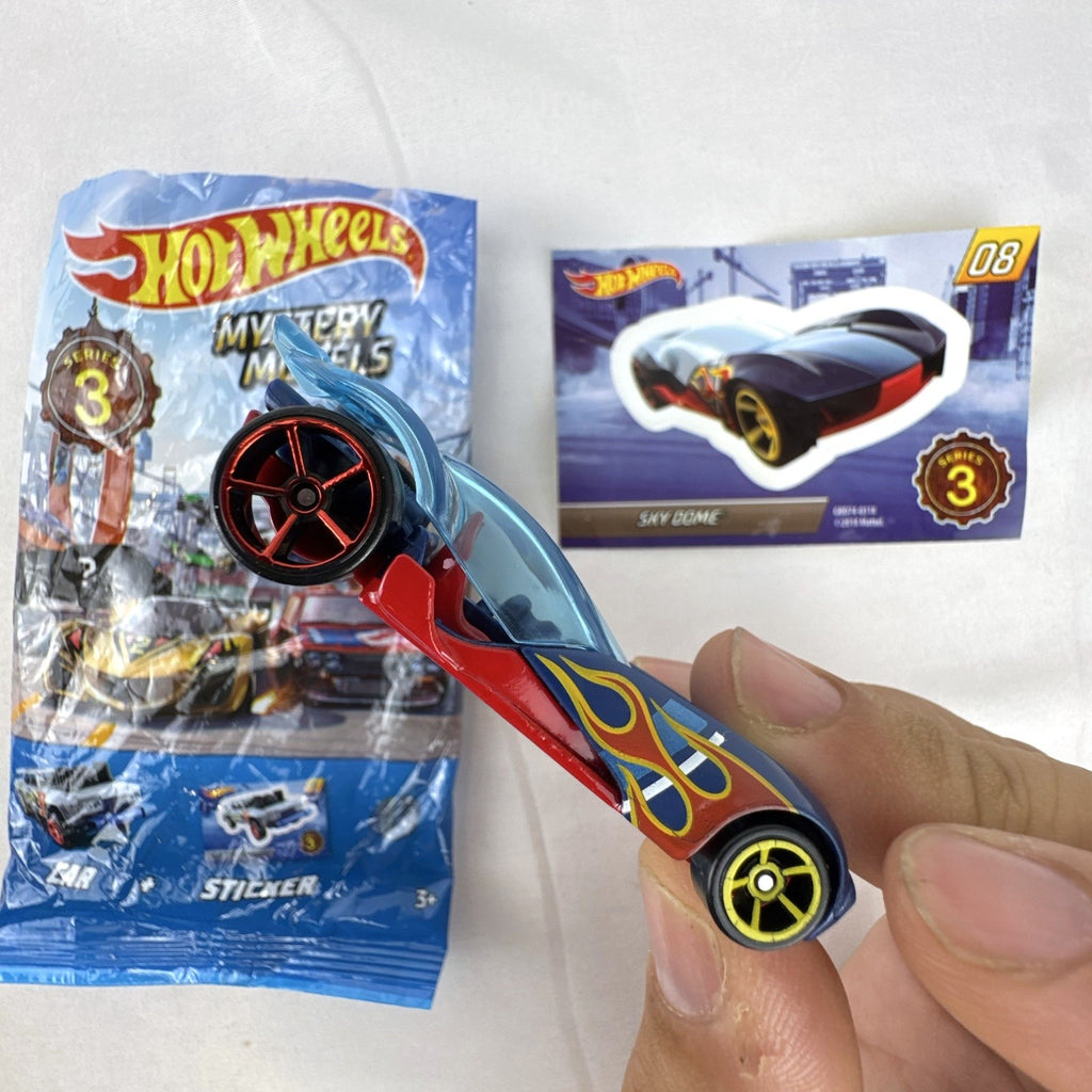 Hot Wheels Sky Dome 1:64 scale diecast car in dark blue with original Mystery Models Series 3 sticker card and bag.
