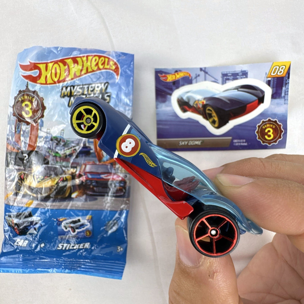 Hot Wheels Sky Dome 1:64 scale diecast car in dark blue with original Mystery Models Series 3 sticker card and bag.