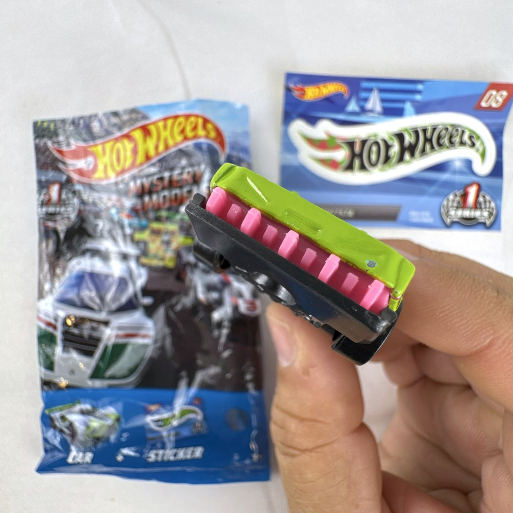 1:64 scale lime green Hot Wheels Driftsta #08 diecast car with Mystery Models sticker card and foil pack.