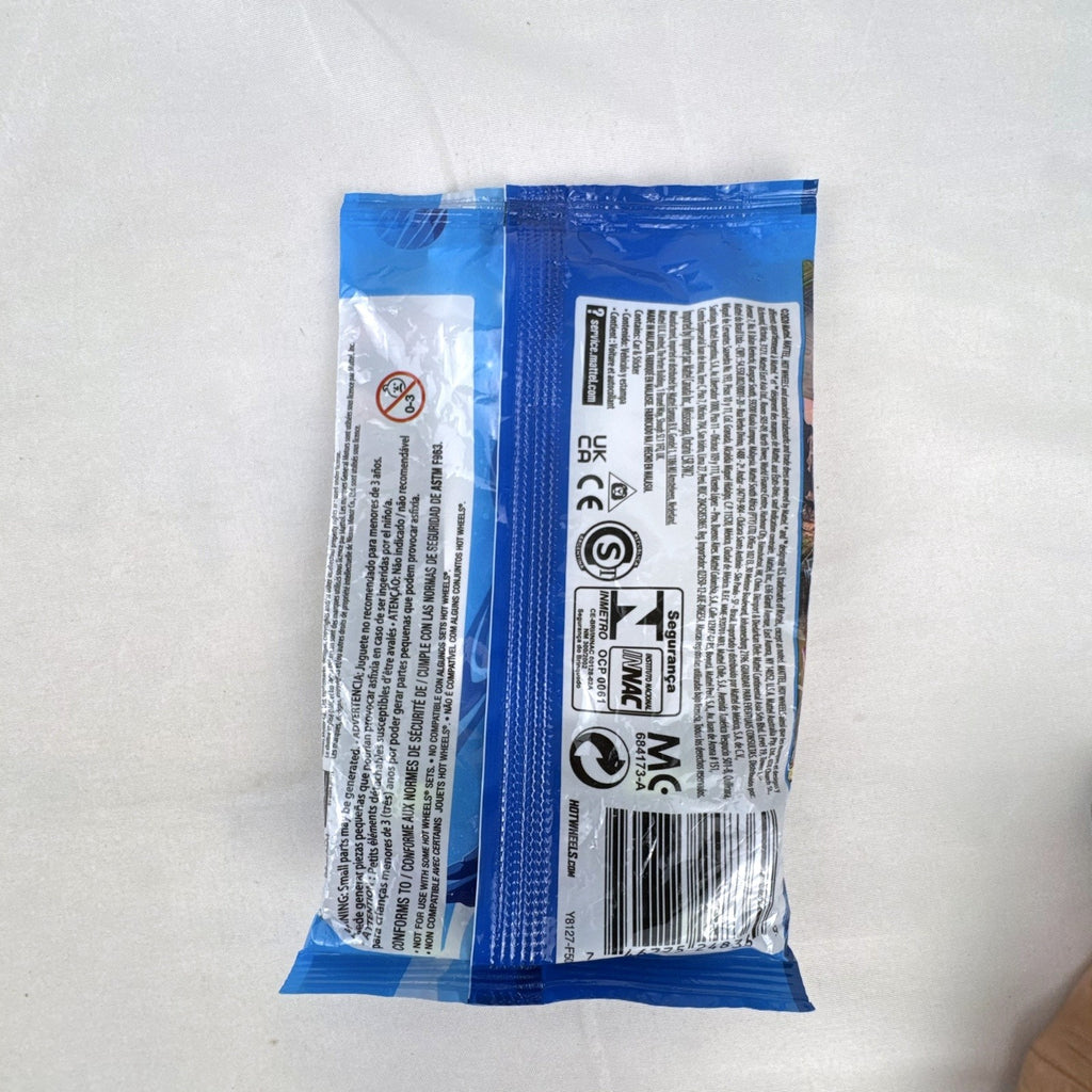Sealed Hot Wheels Mystery Models Series 3 foil pack containing Flight '03 diecast car 1:64 scale