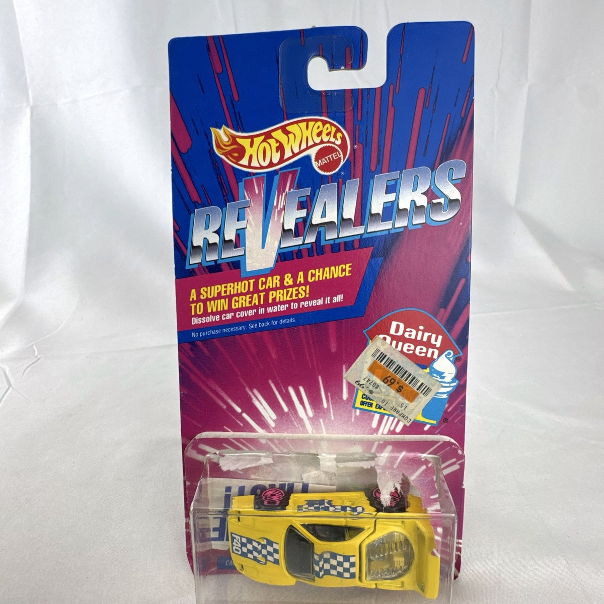 1993 Hot Wheels Ferrari F40 Dairy Queen Revealers diecast car in yellow with hot pink wheels on card