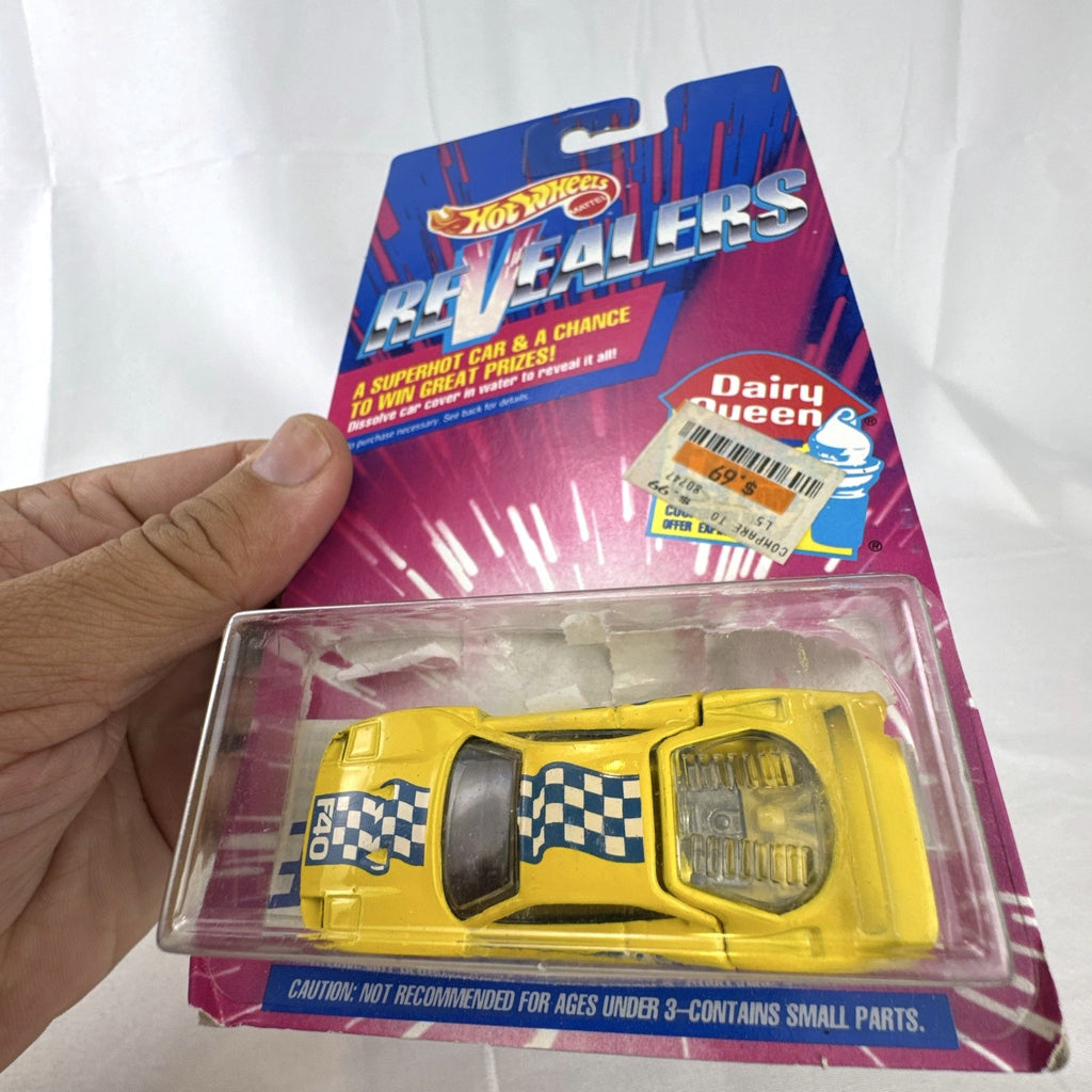 1993 Hot Wheels Ferrari F40 Dairy Queen Revealers diecast car in yellow with hot pink wheels on card