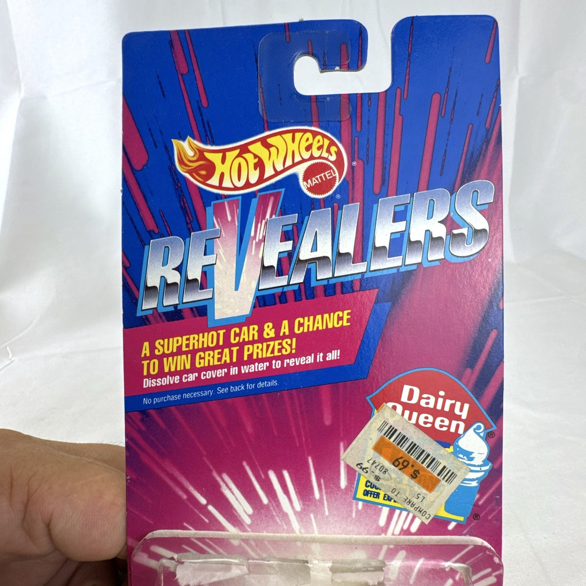 1993 Hot Wheels Ferrari F40 Dairy Queen Revealers diecast car in yellow with hot pink wheels on card