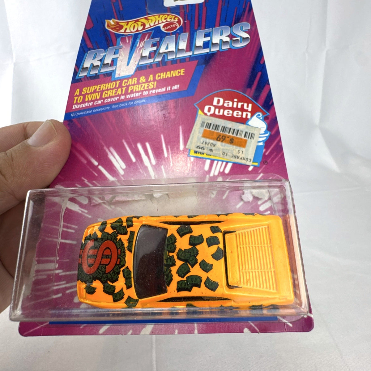 1993 Hot Wheels Revealers Dairy Queen promo 1:64 diecast car sealed on original card with unrevealed money graphics