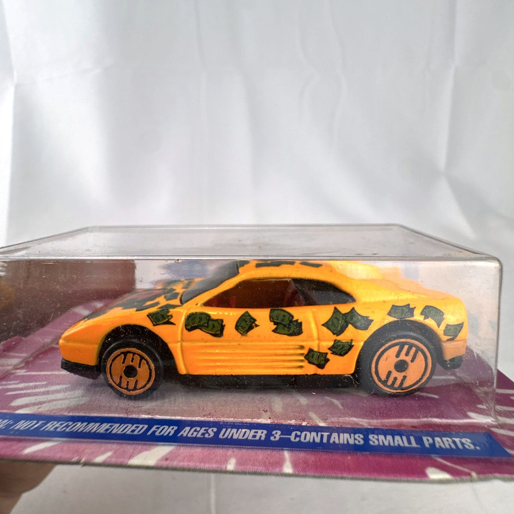 1993 Hot Wheels Revealers Dairy Queen promo 1:64 diecast car sealed on original card with unrevealed money graphics