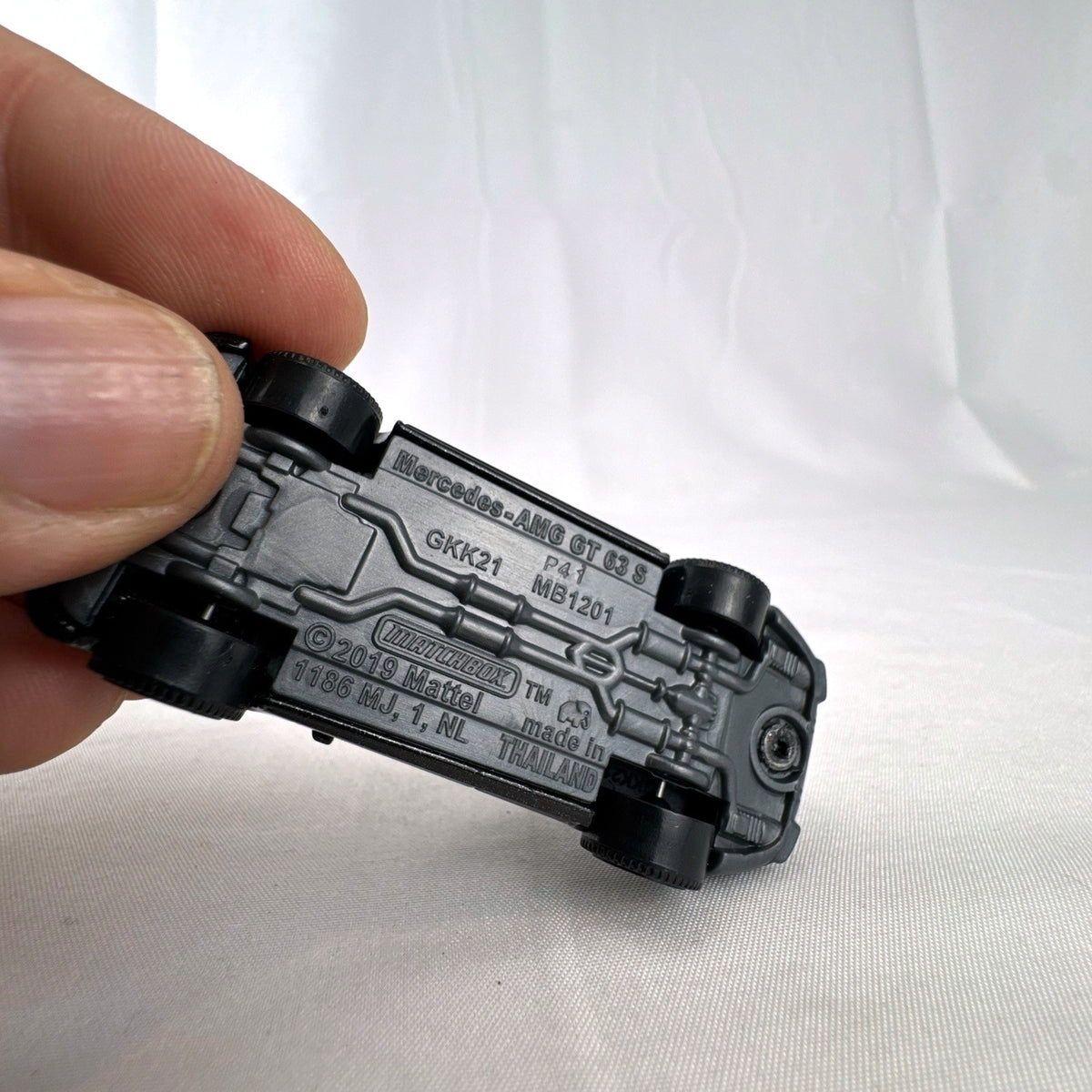 Matchbox 1:64 scale Mercedes-AMG GT 63 S diecast car in black with original Power Grab packaging box.