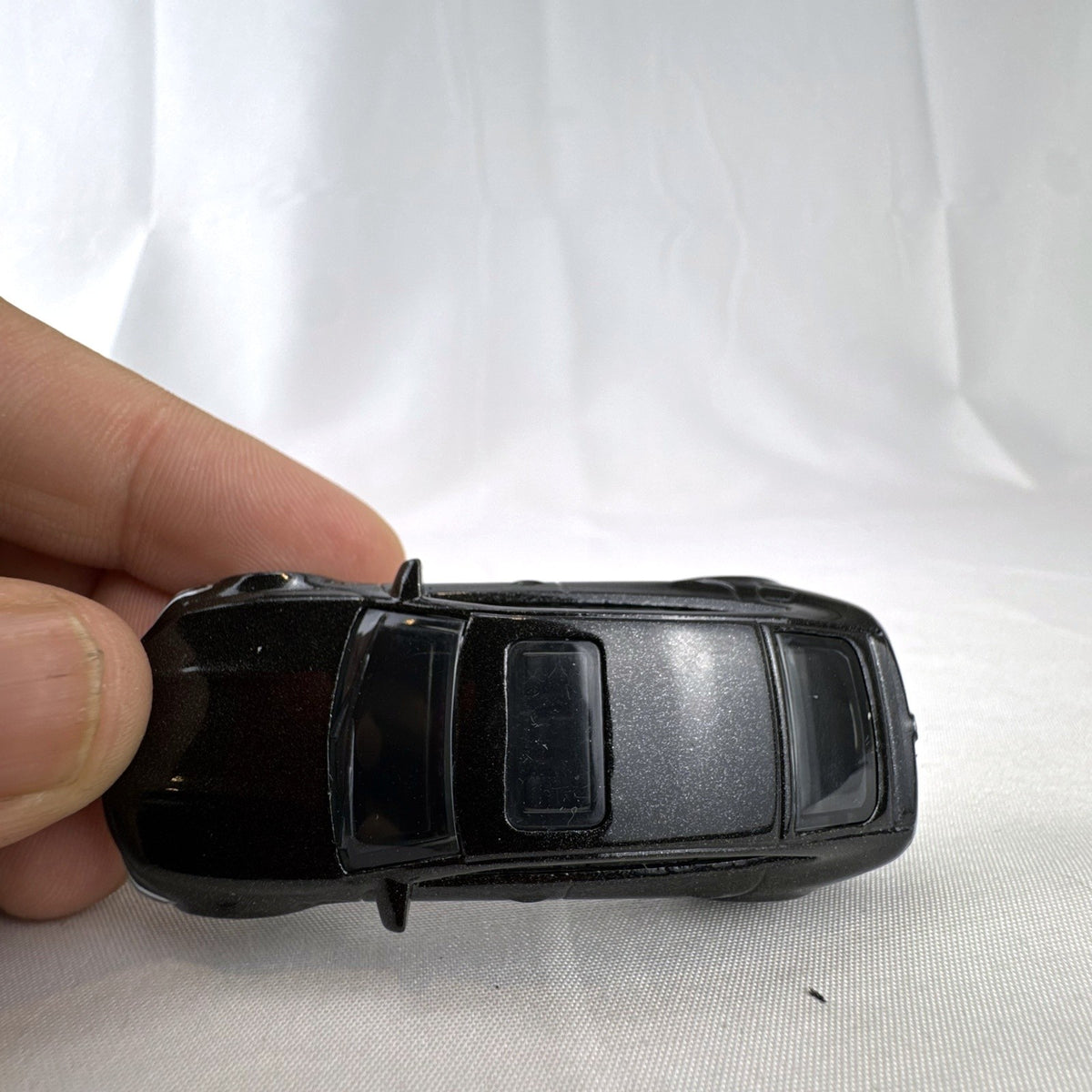 Matchbox 1:64 scale Mercedes-AMG GT 63 S diecast car in black with original Power Grab packaging box.