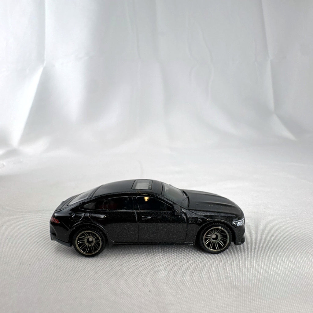 Matchbox 1:64 scale Mercedes-AMG GT 63 S diecast car in black with original Power Grab packaging box.