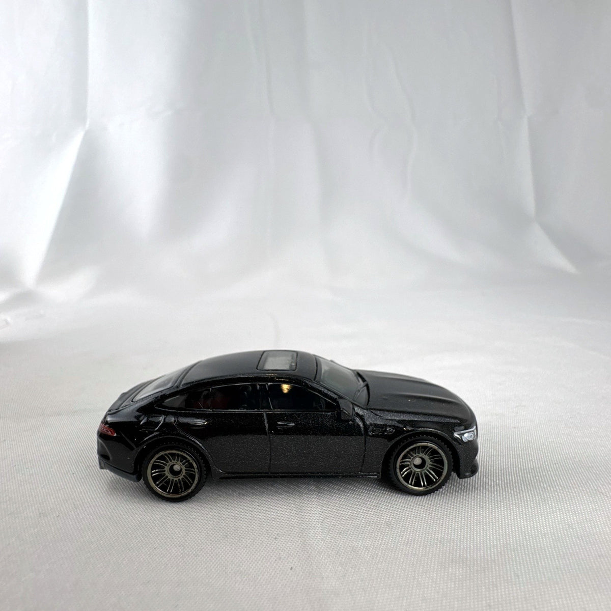 Matchbox 1:64 scale Mercedes-AMG GT 63 S diecast car in black with original Power Grab packaging box.