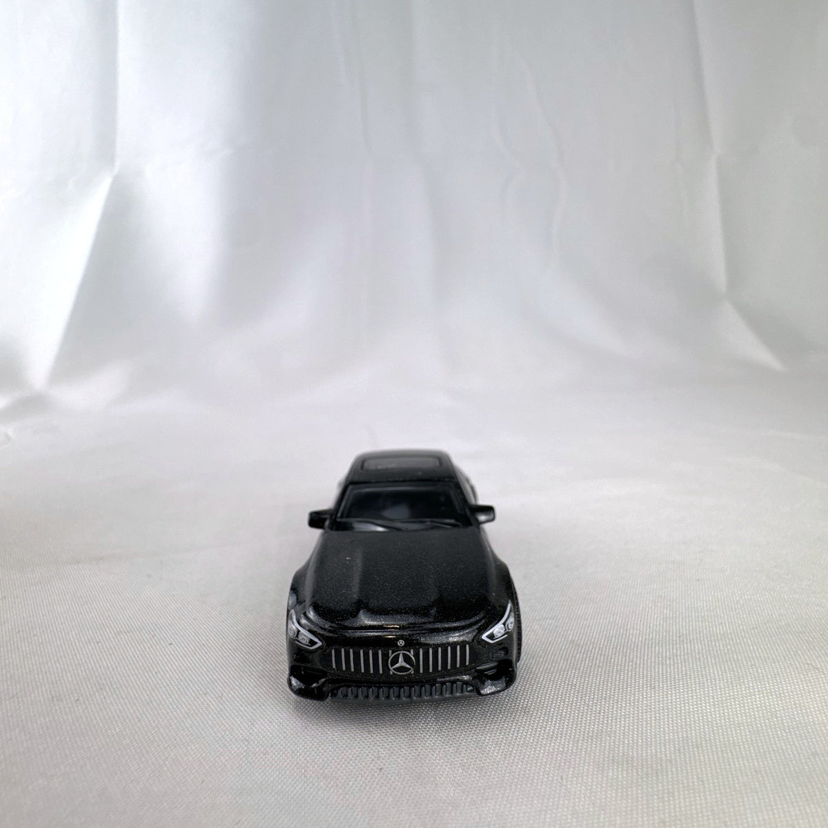 Matchbox 1:64 scale Mercedes-AMG GT 63 S diecast car in black with original Power Grab packaging box.