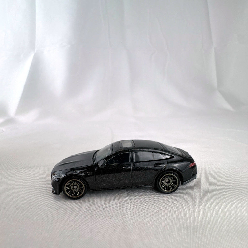 Matchbox 1:64 scale Mercedes-AMG GT 63 S diecast car in black with original Power Grab packaging box.