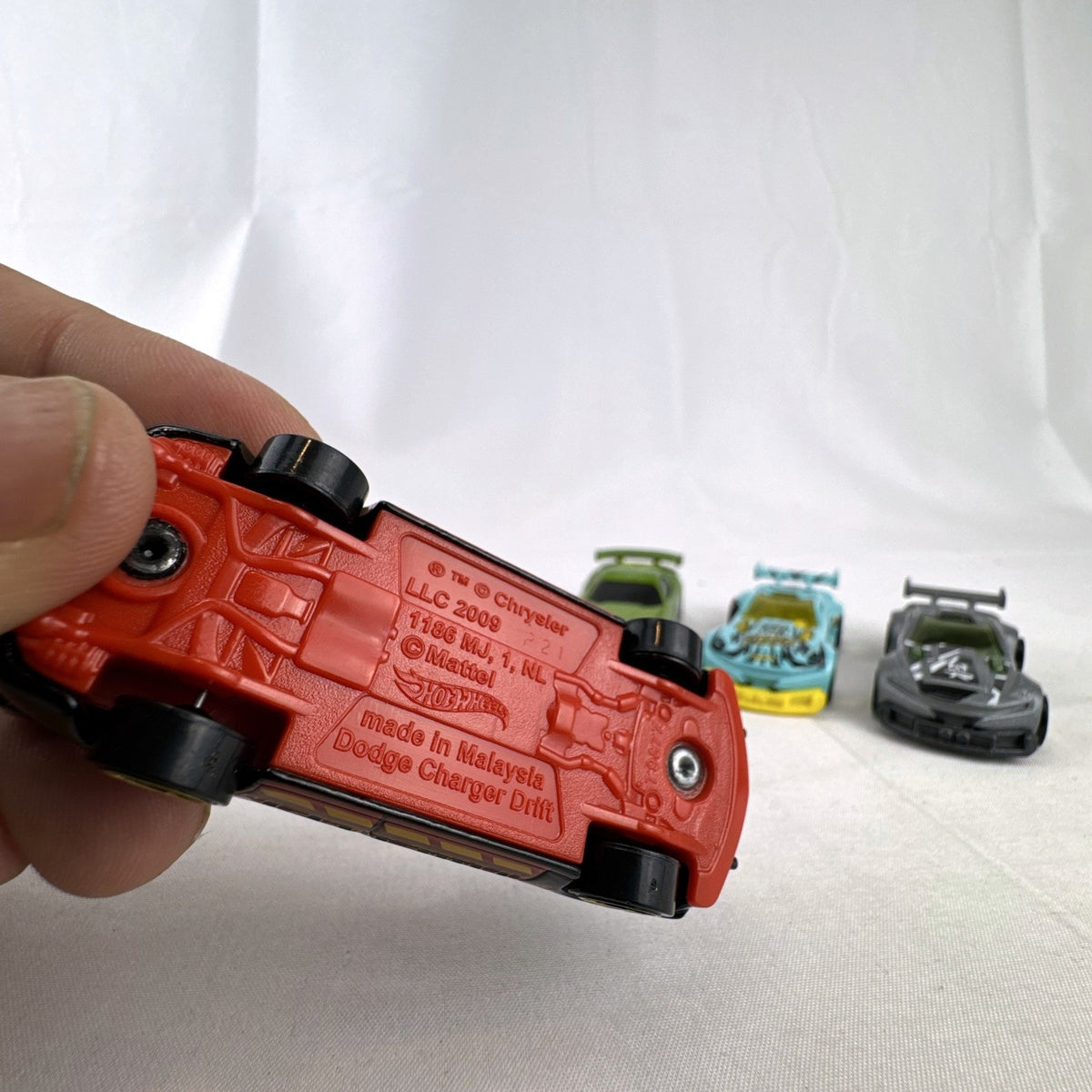 Six pre-owned 1:64 scale Hot Wheels diecast cars including Dodge Viper, Charger, Challenger, and Track Ripper models.