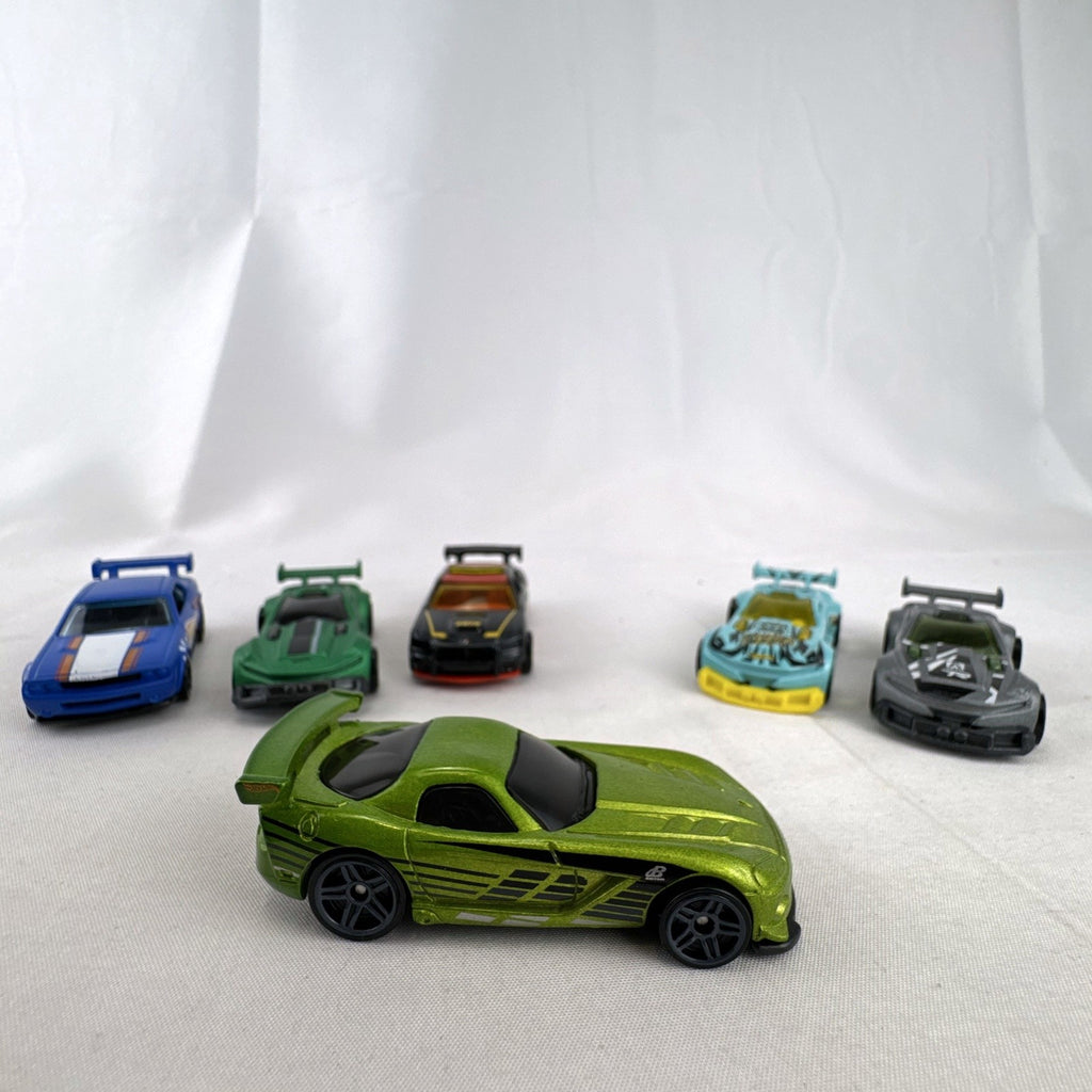 Six pre-owned 1:64 scale Hot Wheels diecast cars including Dodge Viper, Charger, Challenger, and Track Ripper models.