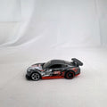 Hot Wheels 1:64 Custom '18 Ford Mustang GT Formula Drift diecast car in dark gray with red chassis base