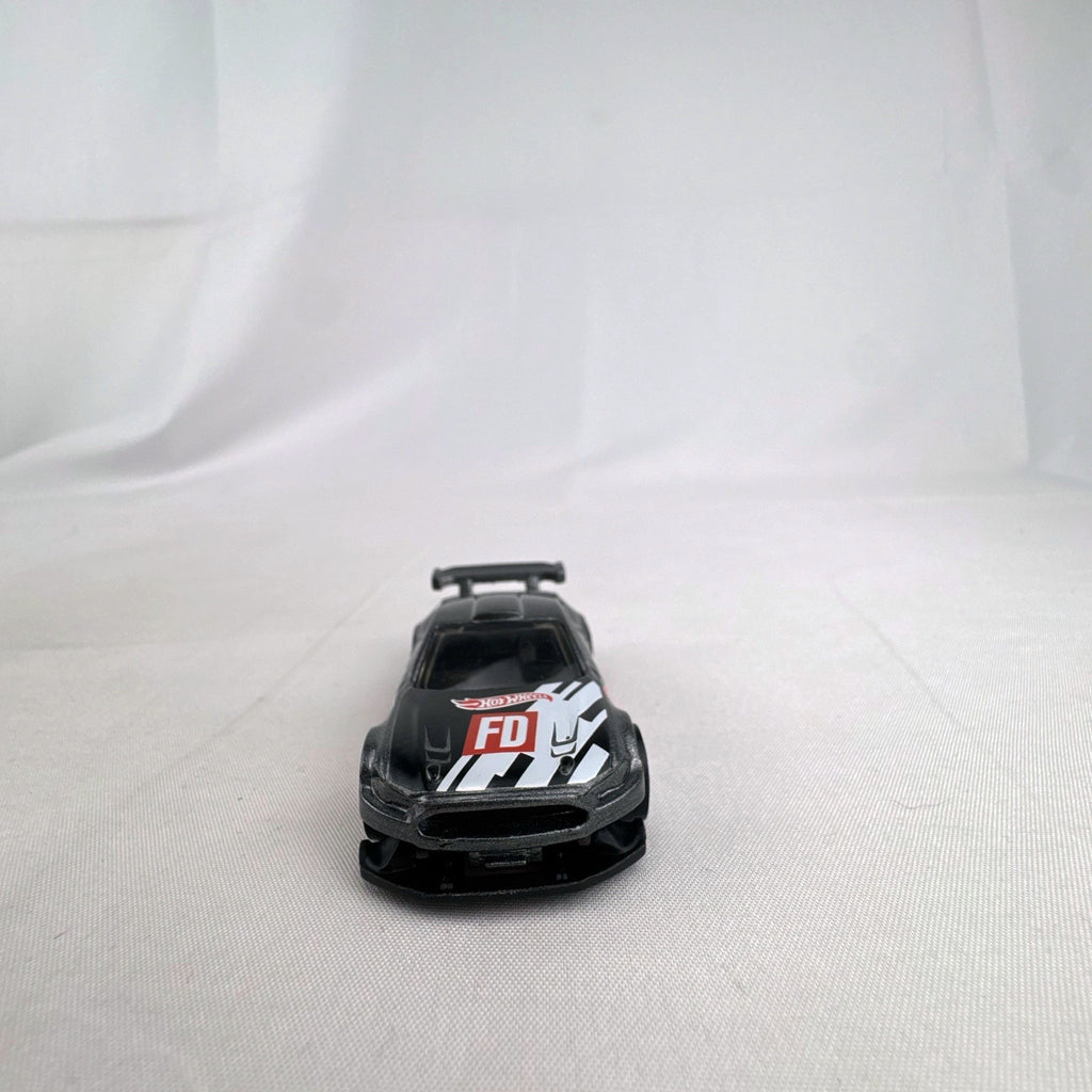 Hot Wheels 1:64 Custom '18 Ford Mustang GT Formula Drift diecast car in dark gray with red chassis base