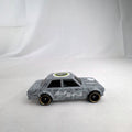 Hot Wheels 1:64 scale 1971 Datsun Bluebird 510 diecast car in grey with Kaido House topographic graphics