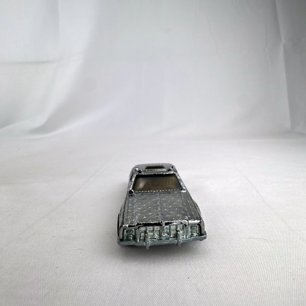 Hot Wheels 1:64 scale vintage Sheriff Patrol diecast car featuring an embossed silver chrome diamond finish