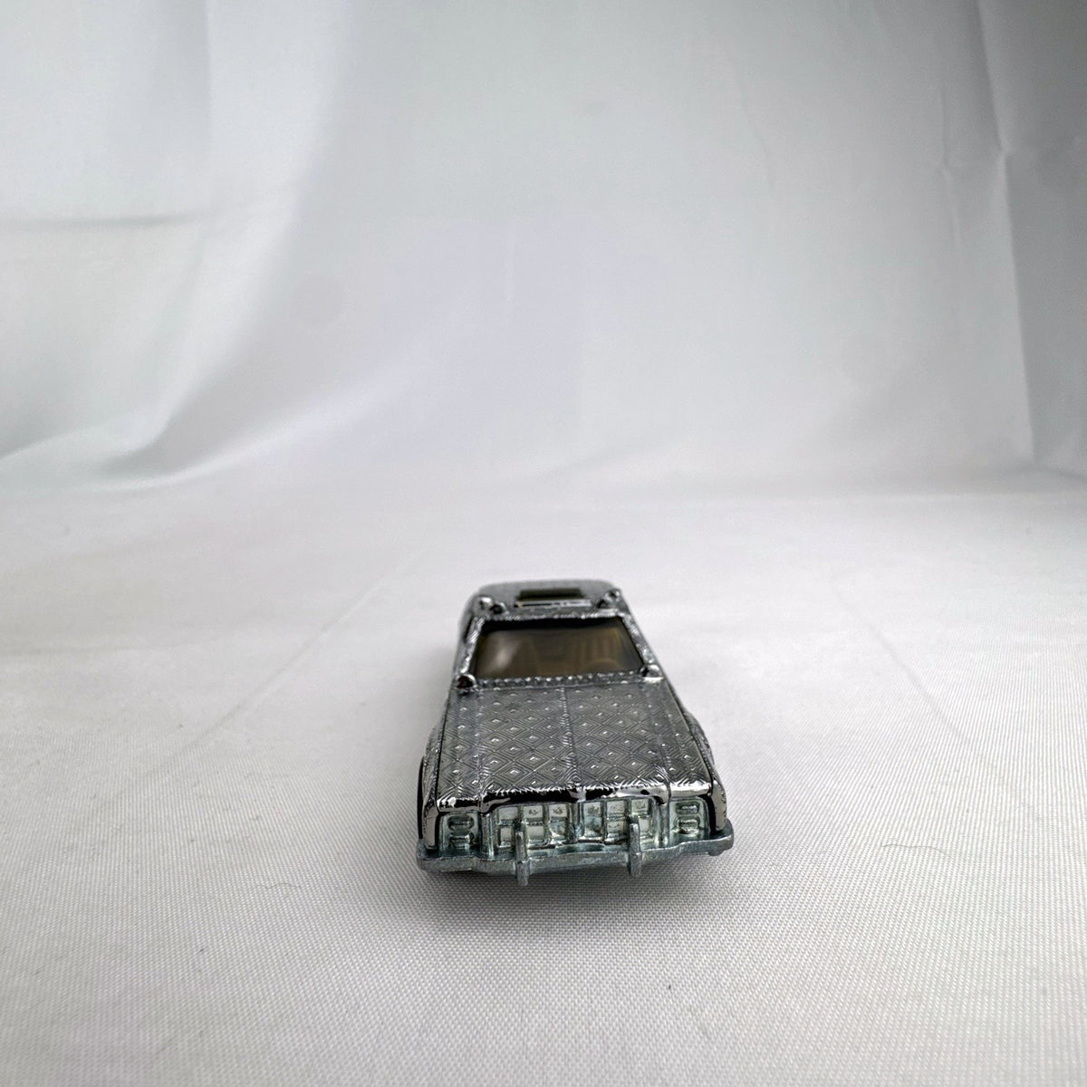 Hot Wheels 1:64 scale vintage Sheriff Patrol diecast car featuring an embossed silver chrome diamond finish