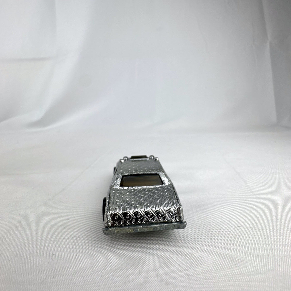 Hot Wheels 1:64 scale vintage Sheriff Patrol diecast car featuring an embossed silver chrome diamond finish