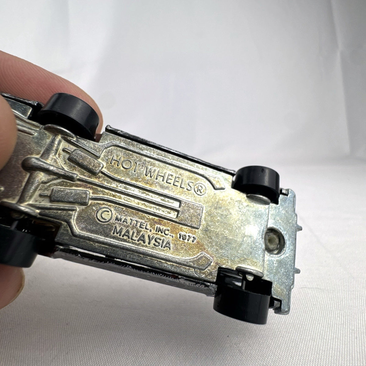 Hot Wheels 1:64 scale vintage Sheriff Patrol diecast car featuring an embossed silver chrome diamond finish
