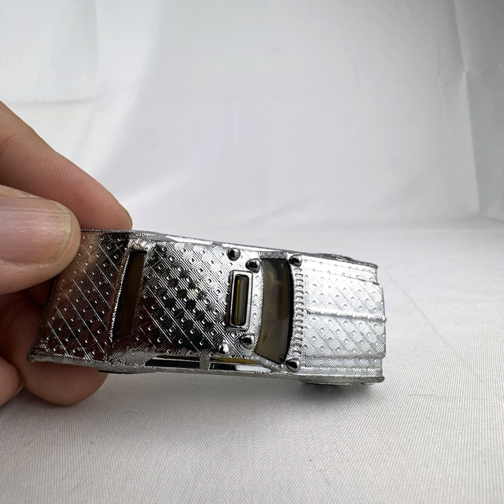 Hot Wheels 1:64 scale vintage Sheriff Patrol diecast car featuring an embossed silver chrome diamond finish