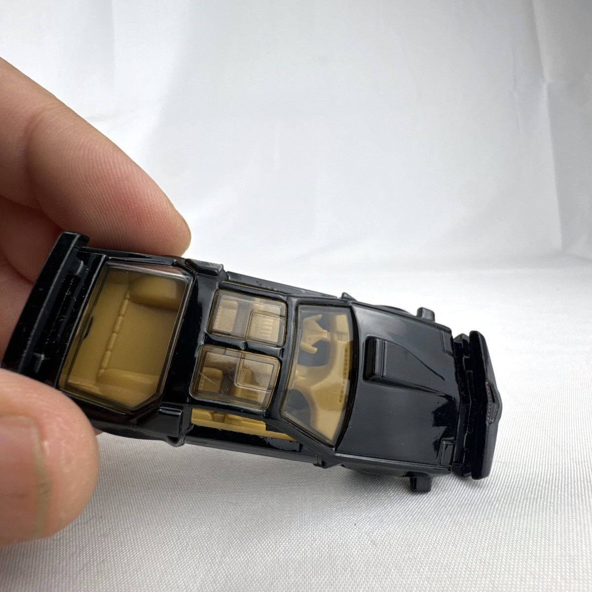 Hot Wheels 1:64 scale diecast Knight Rider K.I.T.T. Super Pursuit Mode Pontiac Trans Am in black
