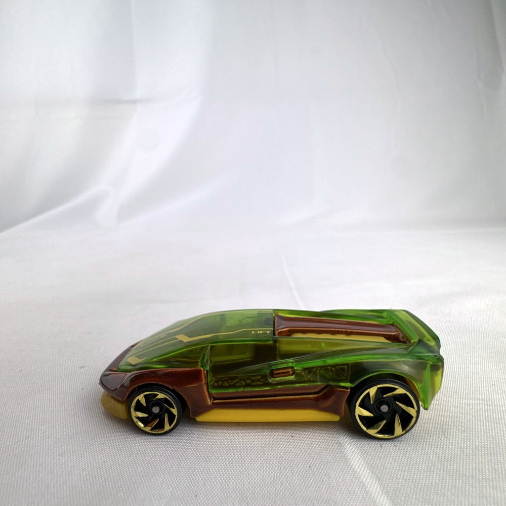 Hot Wheels El Viento 1:64 scale diecast car with translucent green canopy and yellow accents