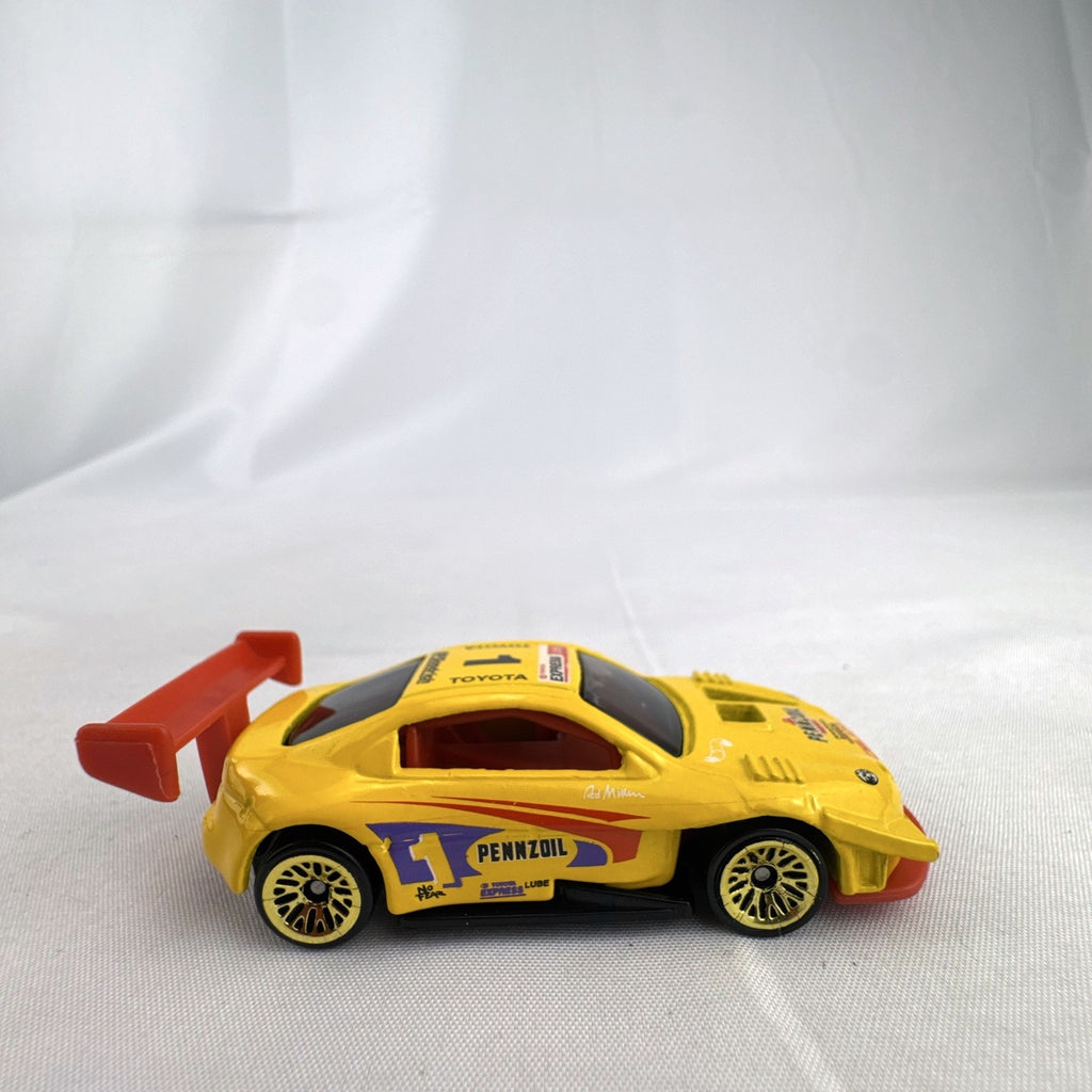 Hot Wheels 1:64 scale 1998 Toyota Pikes Peak Celica diecast race car in yellow Pennzoil livery
