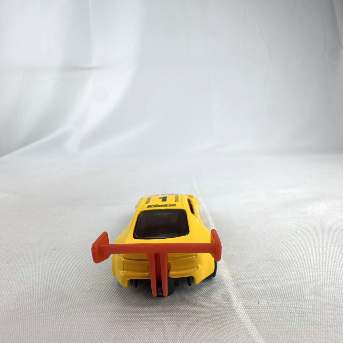 Hot Wheels 1:64 scale 1998 Toyota Pikes Peak Celica diecast race car in yellow Pennzoil livery