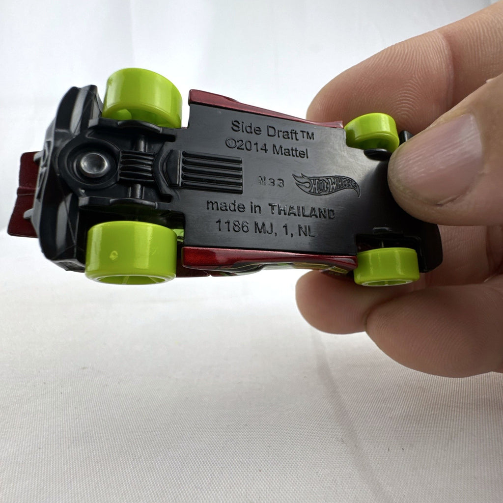 Hot Wheels Side Draft 1:64 scale diecast car in metallic red with lime green wheels
