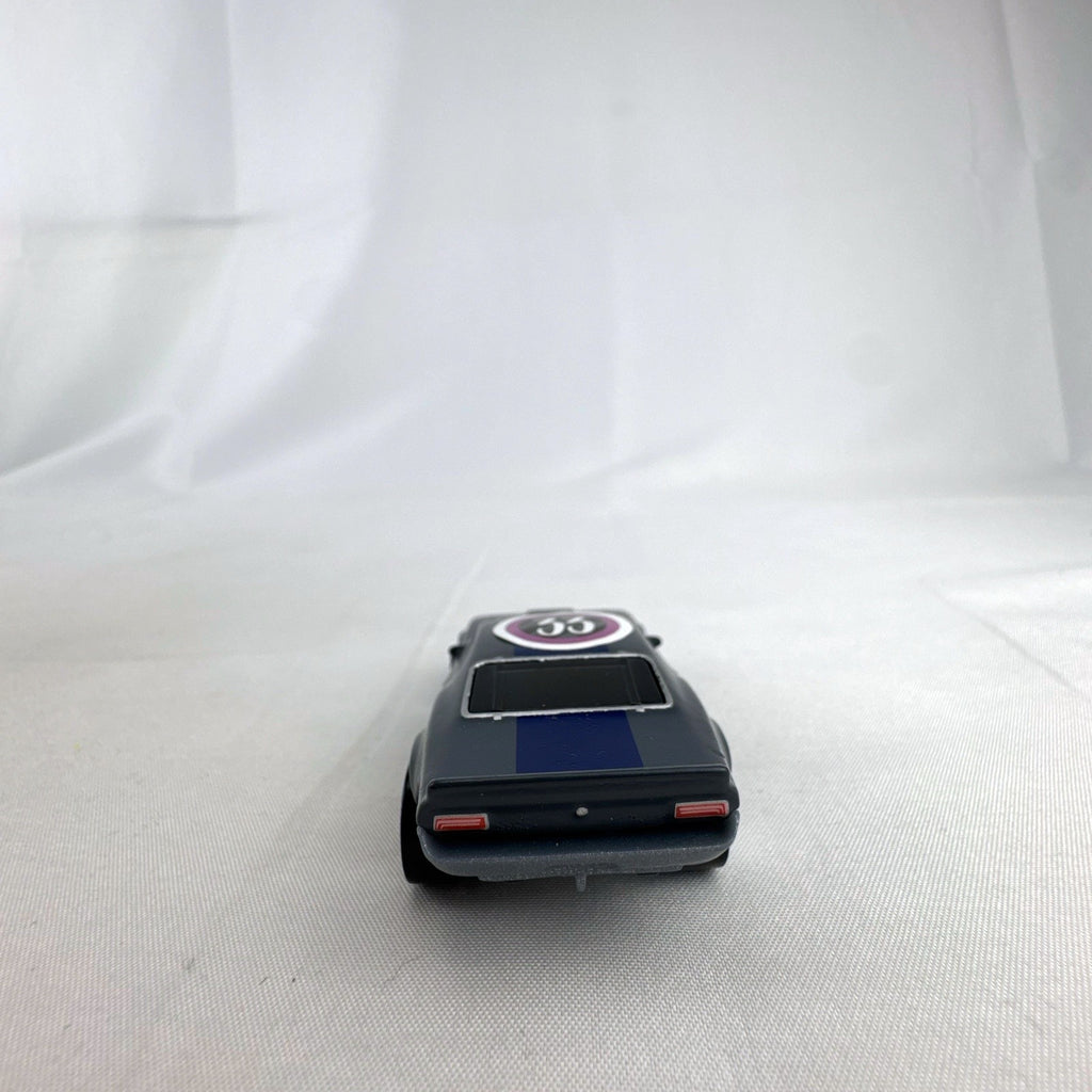 Hot Wheels 1:64 scale Ion Motors Thresher diecast car in gray with blue racing stripes from Fast and Furious Spy Racers