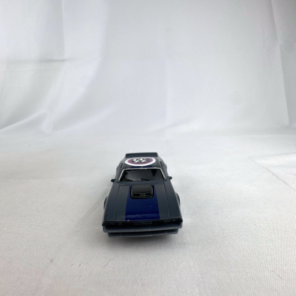 Hot Wheels 1:64 scale Ion Motors Thresher diecast car in gray with blue racing stripes from Fast and Furious Spy Racers