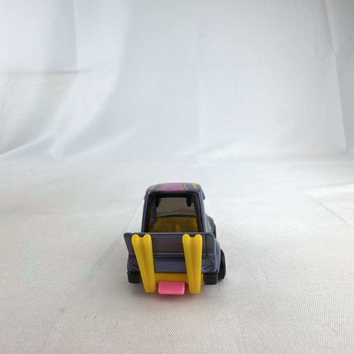 Hot Wheels HW Tooned Manga Tuner 1:64 scale diecast car in metallic purple with pink base