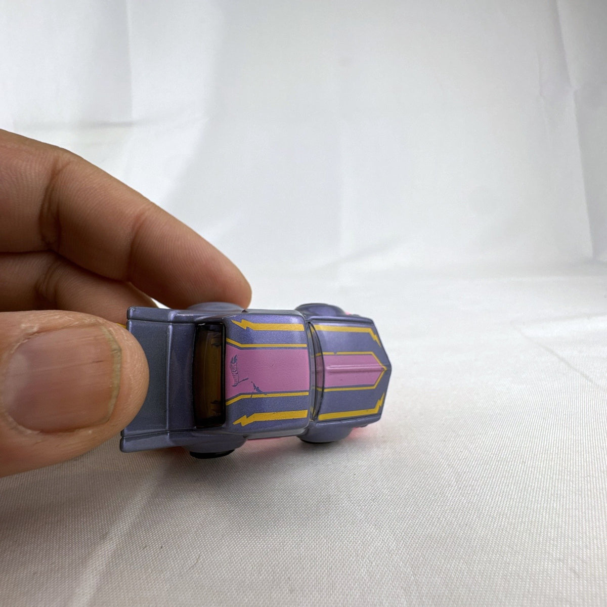 Hot Wheels HW Tooned Manga Tuner 1:64 scale diecast car in metallic purple with pink base