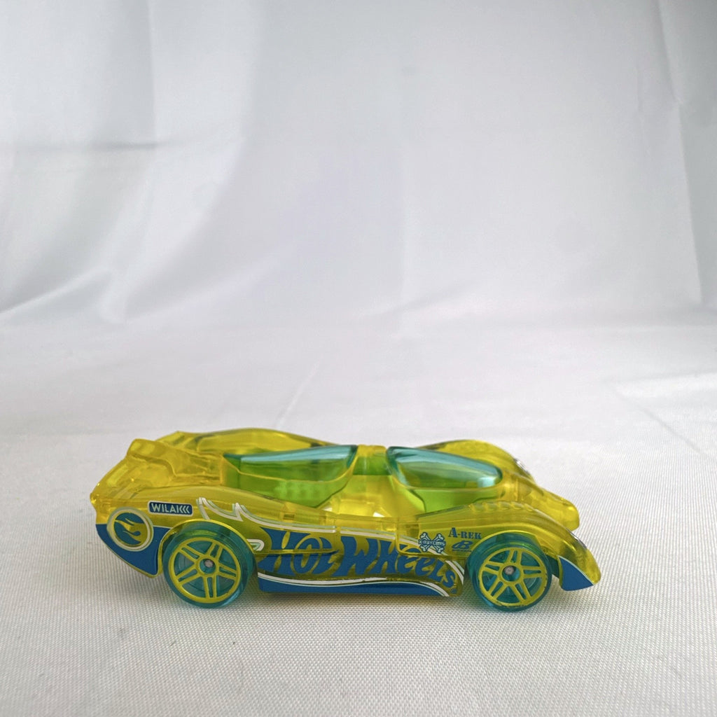 Hot Wheels HW X-Raycers Power Piston in translucent yellow with chrome chassis, 1:64 scale