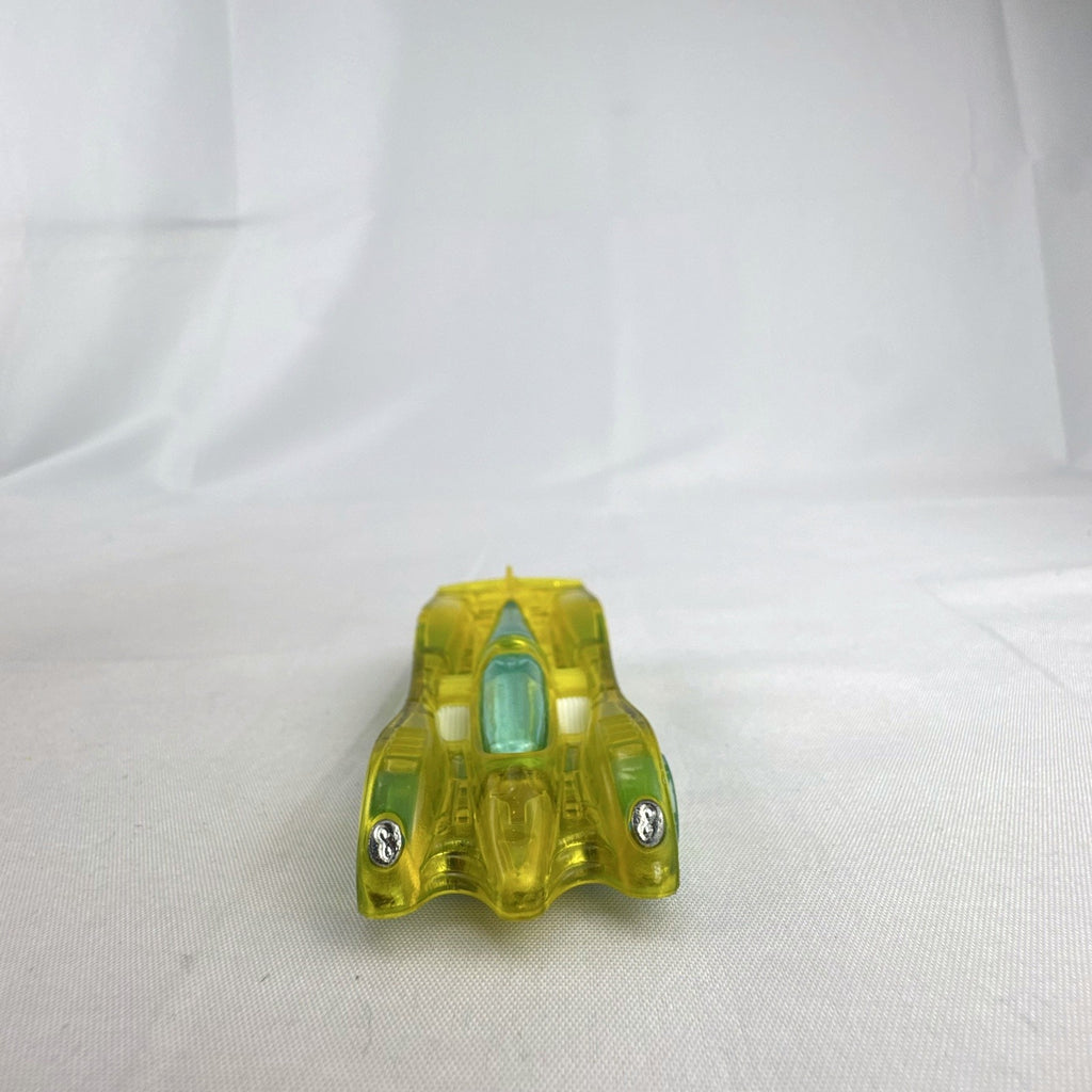 Hot Wheels HW X-Raycers Power Piston in translucent yellow with chrome chassis, 1:64 scale