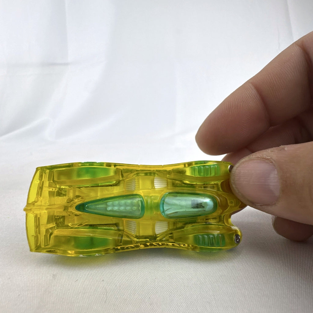 Hot Wheels HW X-Raycers Power Piston in translucent yellow with chrome chassis, 1:64 scale